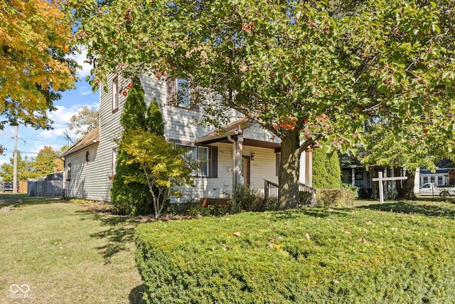 view of front of property with a front lawn