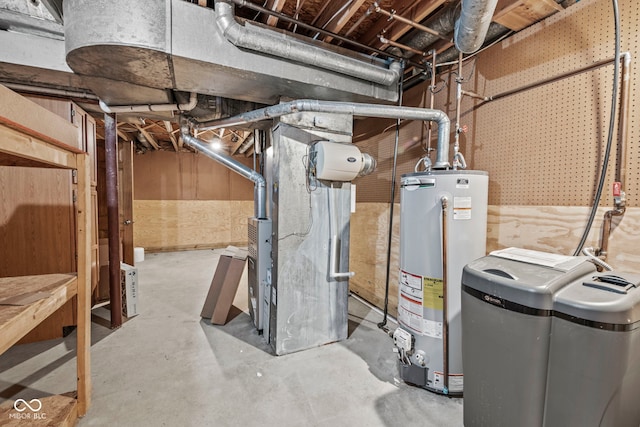 utility room with water heater and heating unit