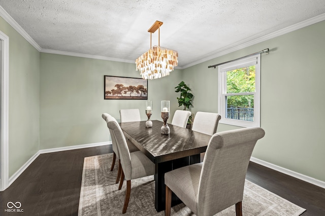 dining space with ornamental molding, an inviting chandelier, a textured ceiling, and dark wood-type flooring