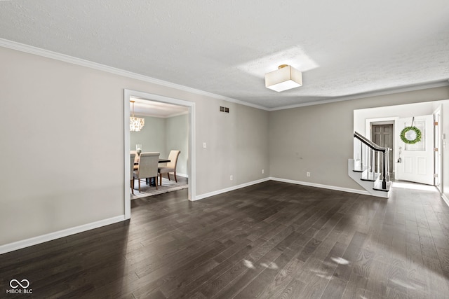 interior space with crown molding, a textured ceiling, and dark hardwood / wood-style flooring