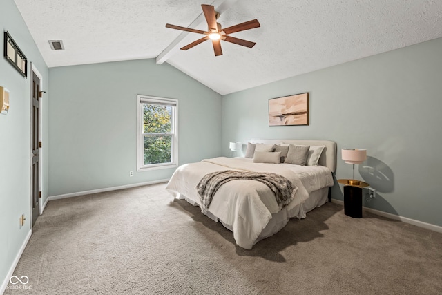 bedroom with carpet, vaulted ceiling with beams, a textured ceiling, and ceiling fan