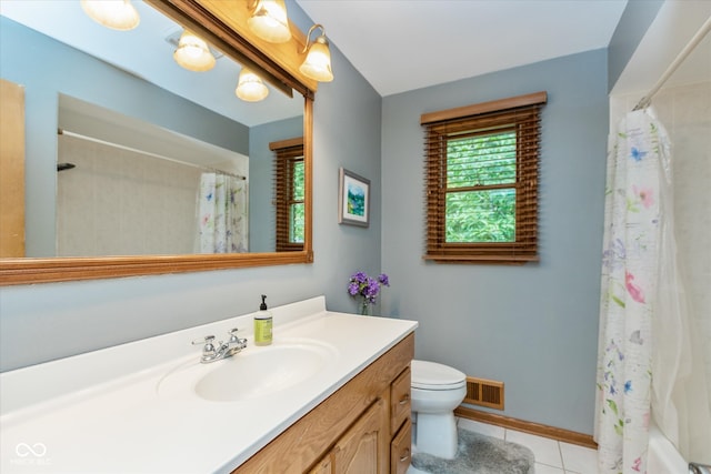 full bathroom featuring vanity, shower / bath combo, toilet, and tile patterned flooring