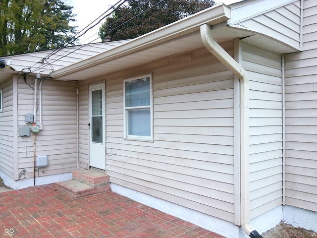 property entrance with a patio area