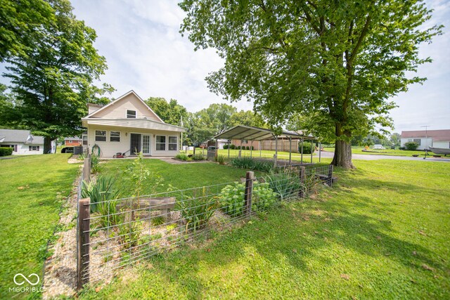 view of yard featuring a carport