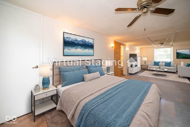 bedroom with hardwood / wood-style flooring and ceiling fan