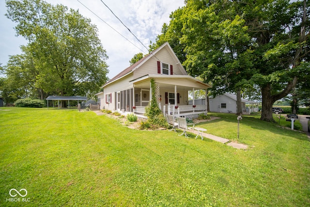 country-style home with a front lawn and a porch