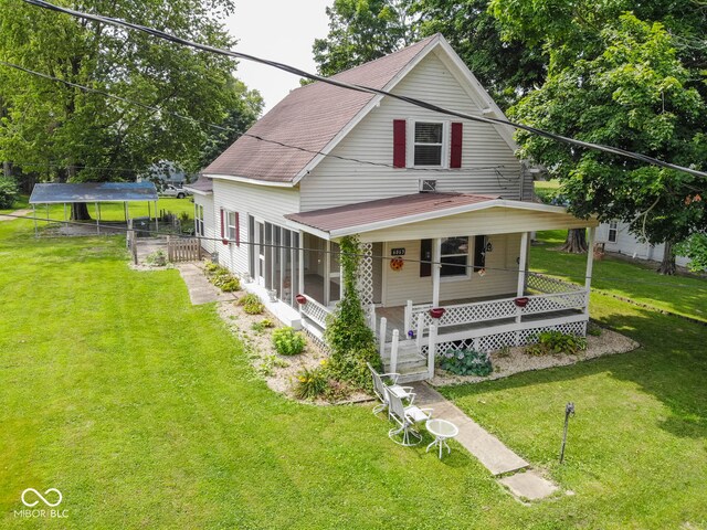 view of front of house featuring a porch and a front yard