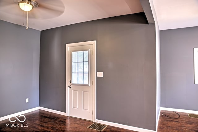 foyer entrance featuring ceiling fan and dark hardwood / wood-style floors