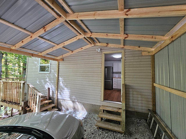 doorway to property featuring cooling unit and washer / dryer