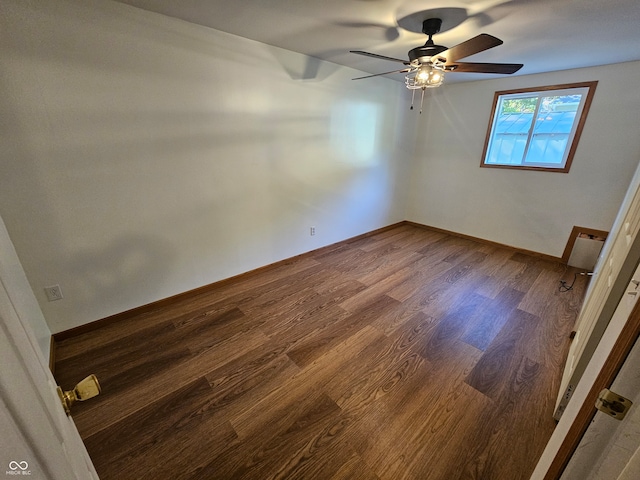 empty room featuring hardwood / wood-style flooring and ceiling fan