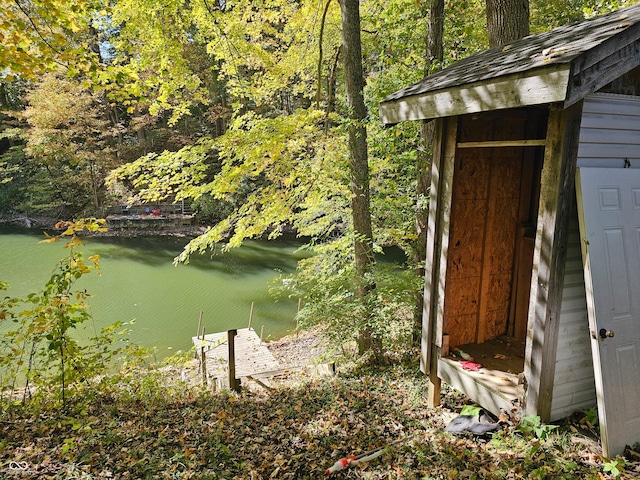 view of outdoor structure with a water view