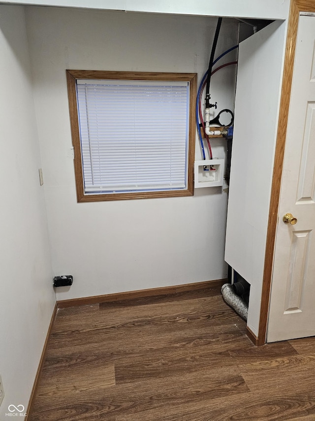 laundry room featuring washer hookup and dark hardwood / wood-style floors