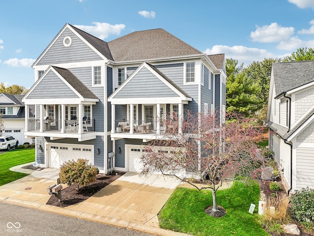 view of front of home with a porch and a garage