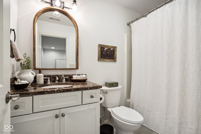 full bathroom featuring vanity, toilet, and shower / bathtub combination with curtain