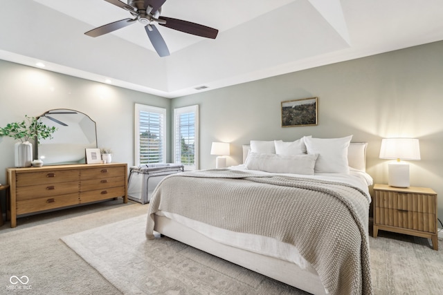 carpeted bedroom featuring ceiling fan