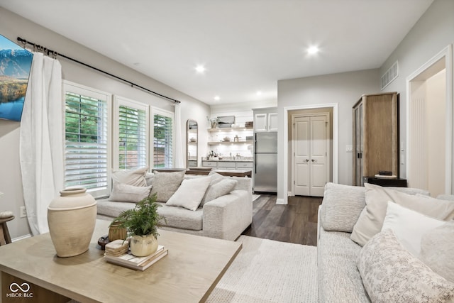 living room featuring dark hardwood / wood-style floors