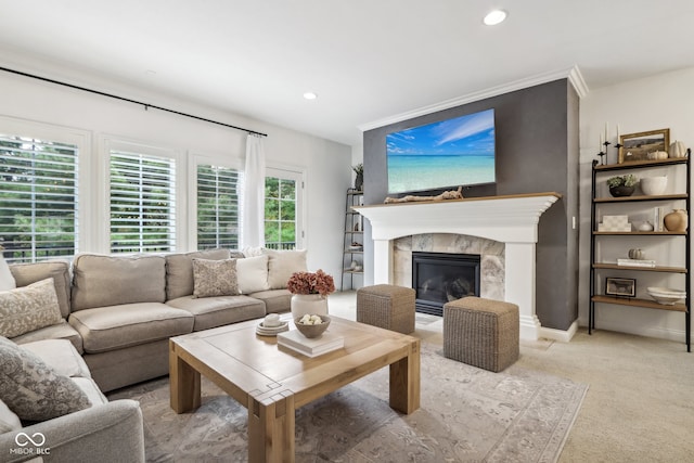 living room featuring a tiled fireplace and light carpet