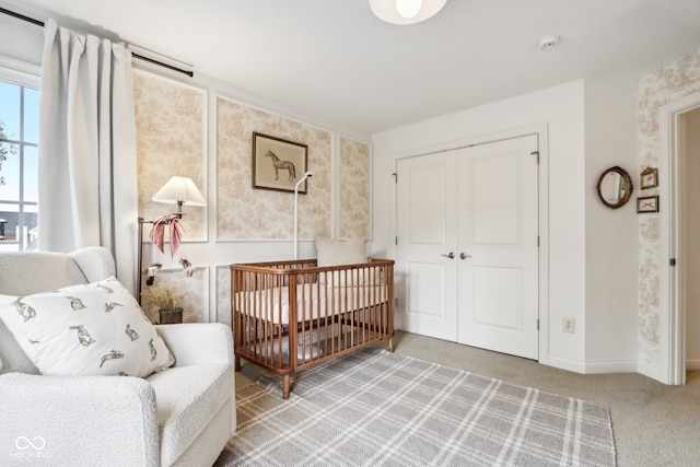 bedroom with a closet and carpet floors