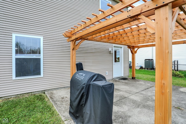 view of patio / terrace featuring a pergola and a grill