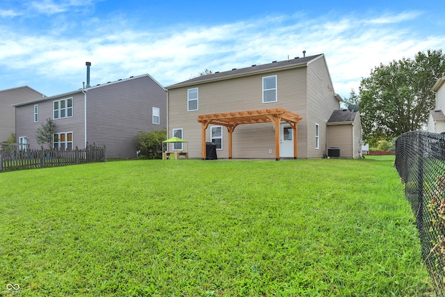 back of property featuring cooling unit, a lawn, and a pergola