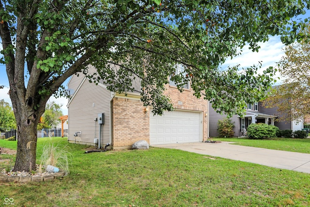 view of side of home featuring a yard