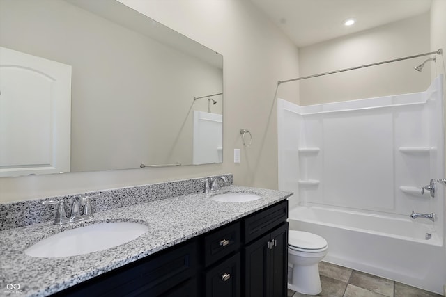 full bathroom with vanity, toilet, tile patterned floors, and  shower combination