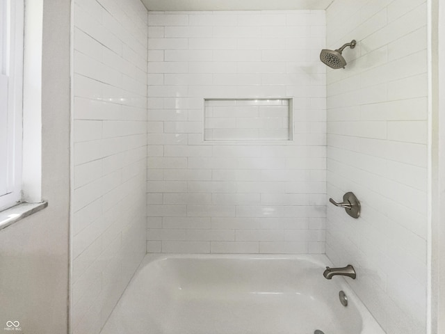 bathroom with shower / bath combination