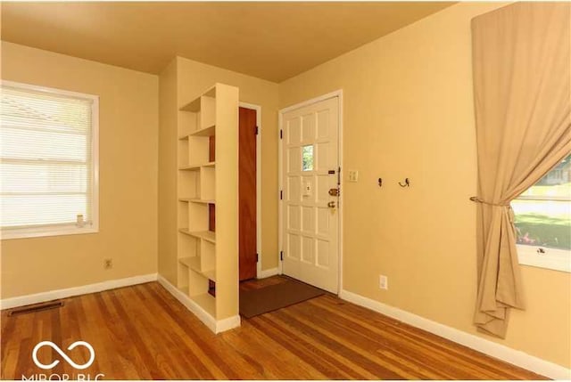 entrance foyer featuring hardwood / wood-style floors