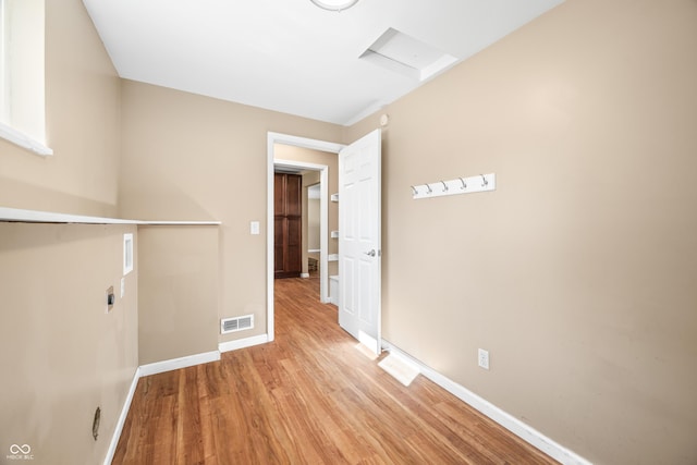 3233 Plum Creek Rd, Nashville, IN 47448 - laundry area featuring laundry area, electric dryer hookup, visible vents, baseboards, and light wood-style floors
