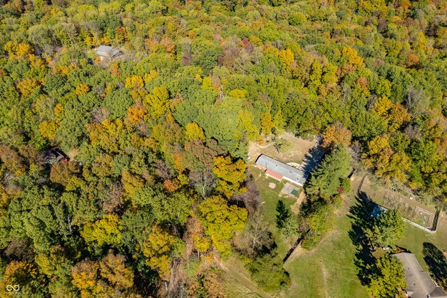3233 Plum Creek Rd, Nashville, IN 47448 - birds eye view of property with a wooded view
