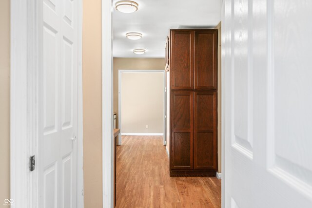 3233 Plum Creek Rd, Nashville, IN 47448 - hallway featuring baseboards and light wood-style floors