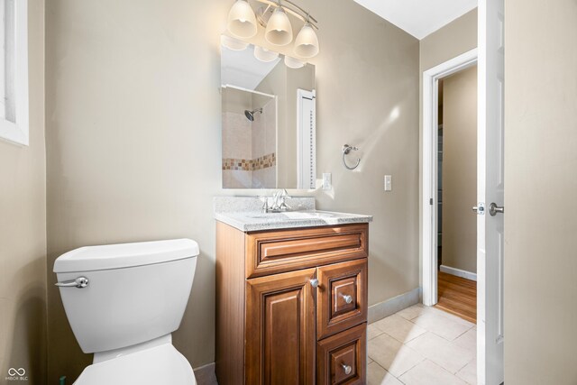3233 Plum Creek Rd, Nashville, IN 47448 - bathroom with vanity, tile patterned flooring, a tile shower, and toilet