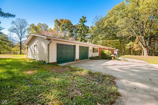 3233 Plum Creek Rd, Nashville, IN 47448 - garage featuring fence and driveway