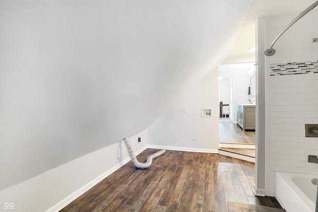 clothes washing area featuring wood-type flooring