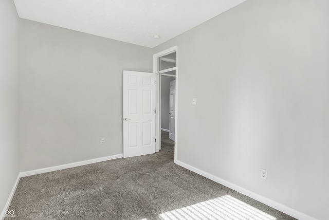 unfurnished bedroom with carpet