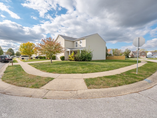 view of property exterior with a yard