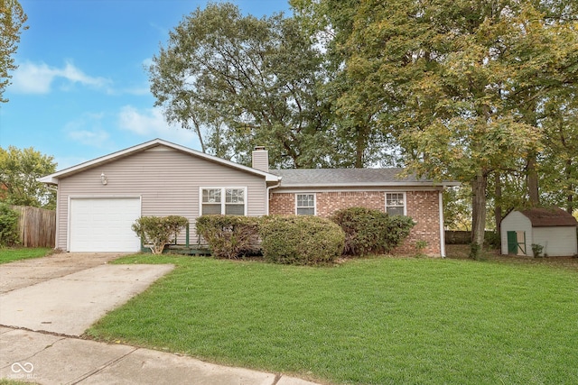 view of front of house featuring a front lawn and a garage