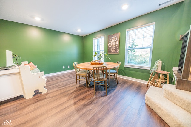 dining room featuring hardwood / wood-style flooring