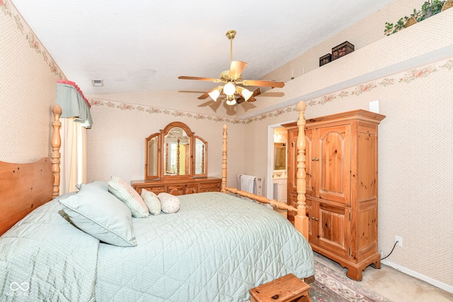 bedroom with vaulted ceiling, carpet flooring, and ceiling fan