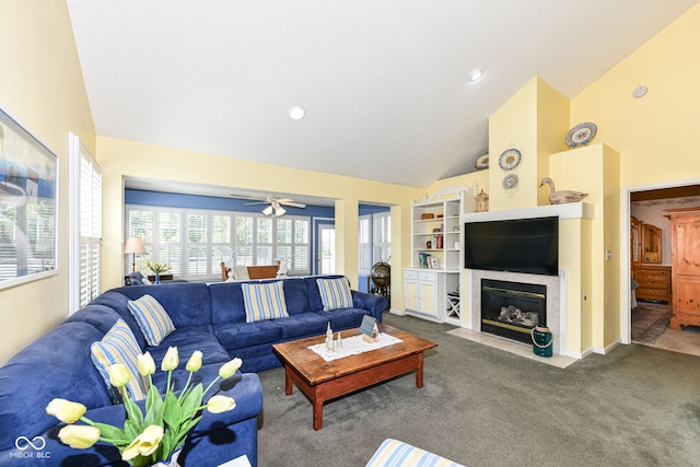 living room with carpet flooring, high vaulted ceiling, and ceiling fan