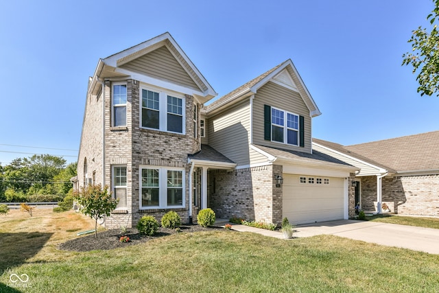 view of front of home with a front yard and a garage