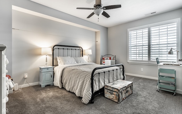 bedroom featuring dark colored carpet and ceiling fan