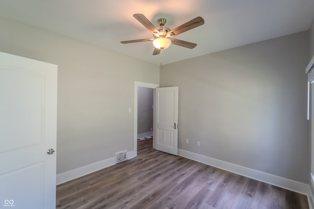 unfurnished bedroom with wood-type flooring and ceiling fan