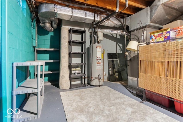 utility room featuring water heater