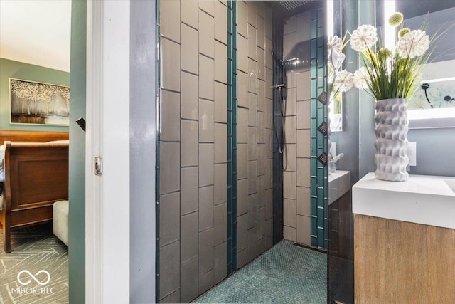 bathroom featuring a tile shower