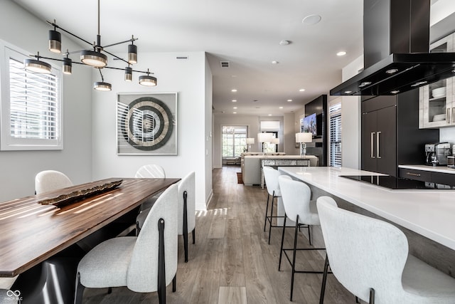 456 Monon Way Dr, Carmel, IN 46032 - dining area featuring recessed lighting, baseboards, and light wood-type flooring