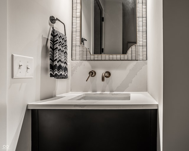 bathroom with vanity and plenty of natural light