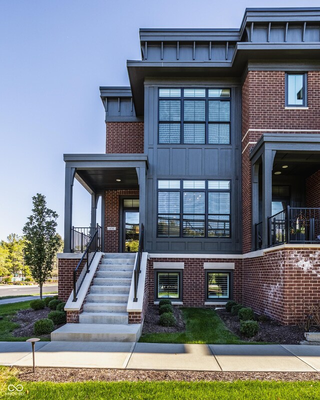 456 Monon Way Dr, Carmel, IN 46032 - view of front of property with brick siding and stairway