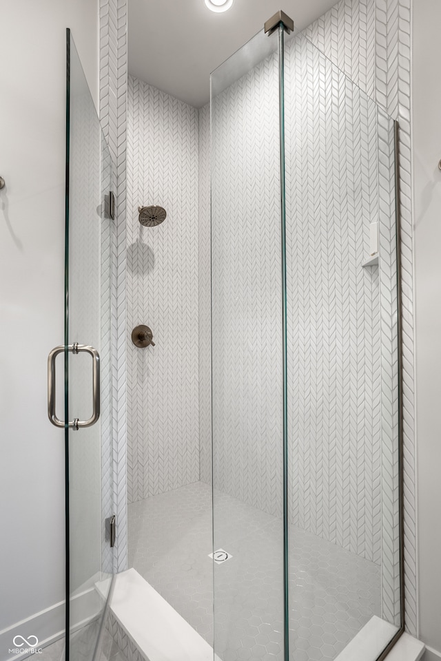 bathroom with an enclosed shower