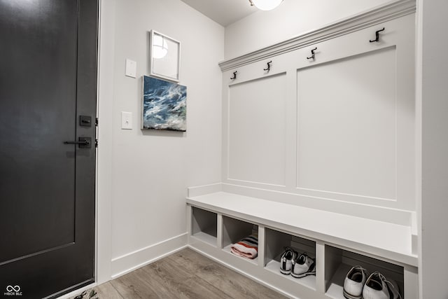 mudroom with light hardwood / wood-style floors